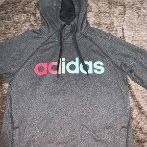 Grey adidas hoodie with pink green and blue logo